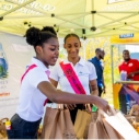 Young ladies holding bags